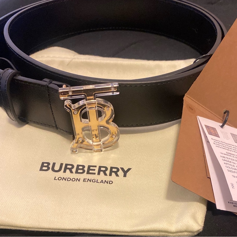 Size 38 Brand new men’s Burberry Belt. Clear with gold buckle.